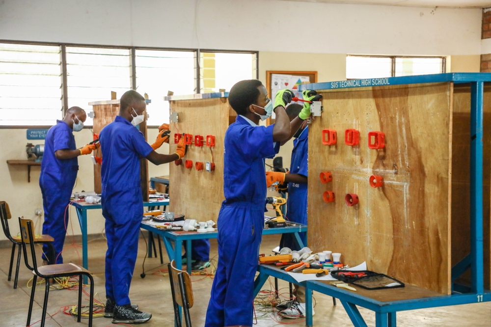 Candidates doing  TVET national practical exam at SOS Gacuriro in Kigali on June 27, 2022. At least 45 per cent of all O-level outstanding performers have been placed into TVET schools. Dan Nsengiyumva