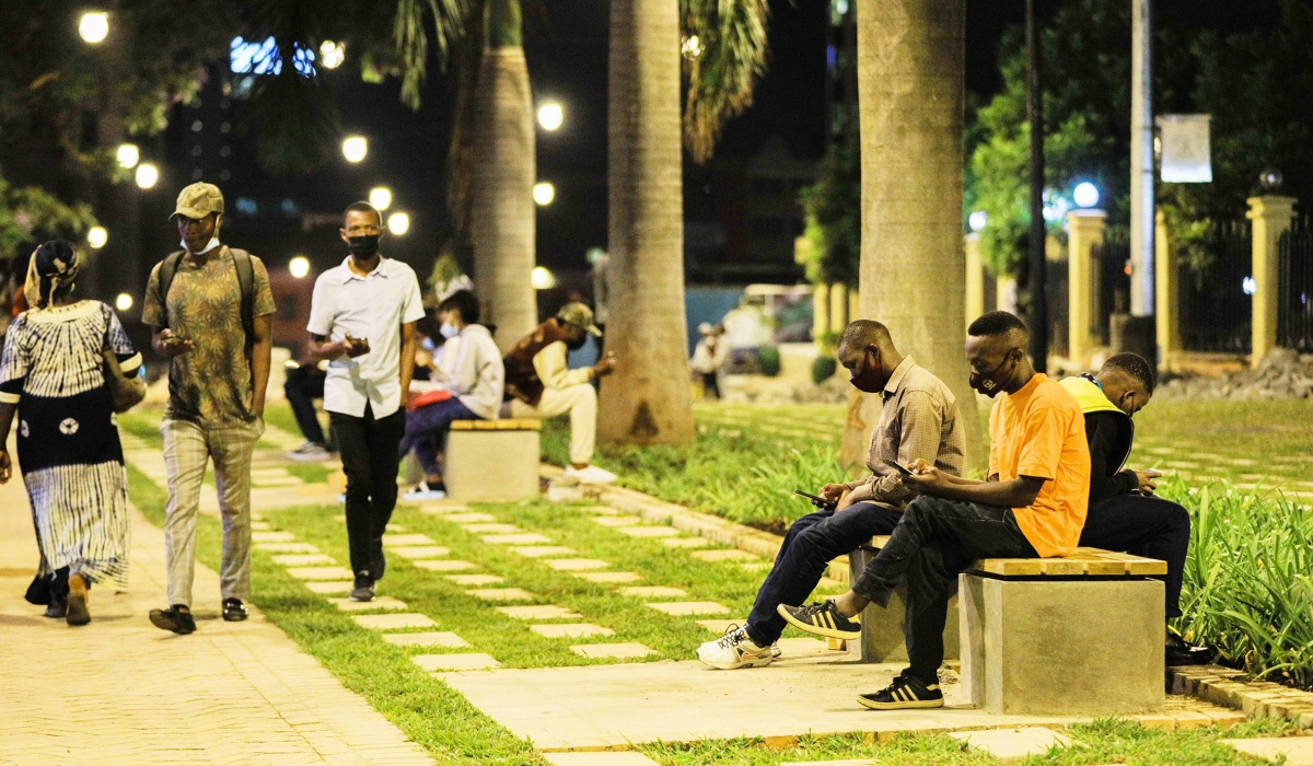 Kigali residents use free internet at Imbuga City Walk. According to a new report, the internet in Africa is 83 per cent less affordable than in Oceania. Photo: Dan Nsengiyumva.