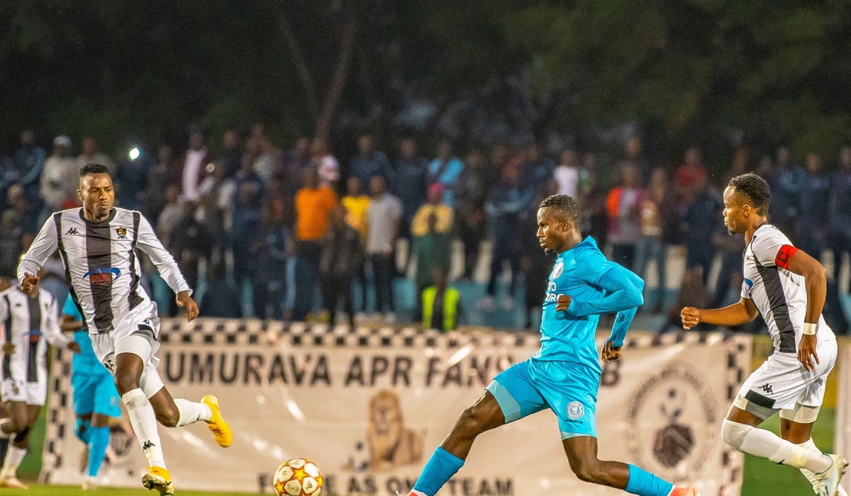 Police FC striker Onesme Twizerimana wins the ball against APR FC skipper Prince Buregeya during a 1-1 draw on October 17. Courtesy