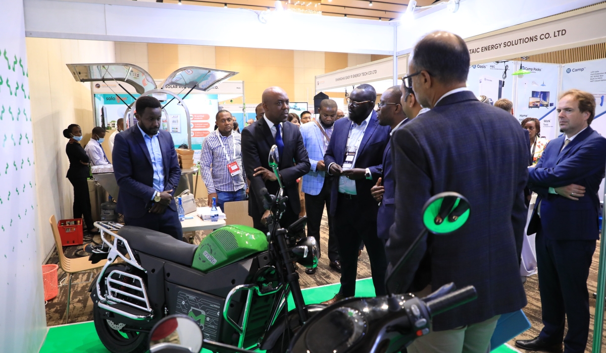 Ernest Nsabimana, the Minister for infrastructure during a guided tour of the exhibition atthe Global Off-Grid Solar Forum & Expo 2022 in Kigali from October 18. Photos by Craish BAHIZI