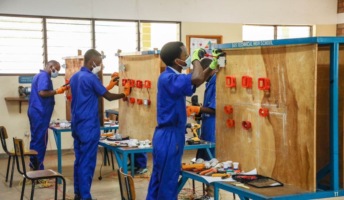 Candidates doing  TVET national practical exam at SOS Gacuriro in Kigali on June 27, 2022. At least 45 per cent of all O-level outstanding performers have been placed into TVET schools. Dan Nsengiyumva