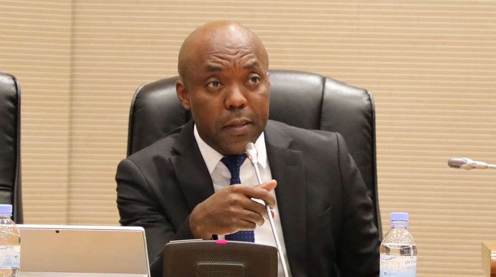Minister for Infrastructure Erneste Nsanzimana presents to the Chamber of Deputies the responses to issues related to water and electricity access across the country on Tuesday, October 18. Courtesy