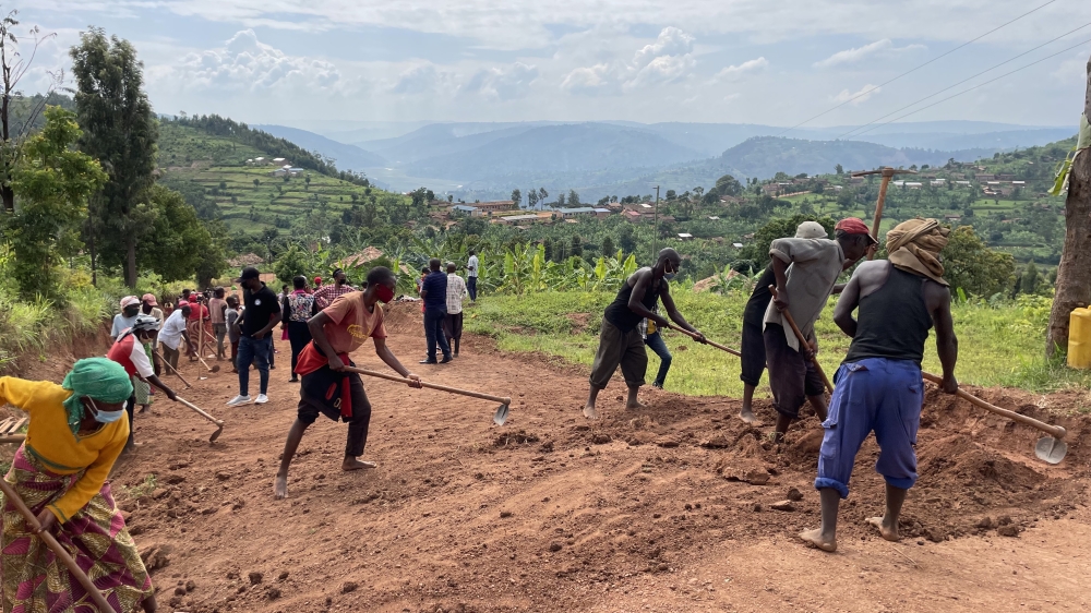 Residents work at a road maintenance project for the Vision Umurenge Programme. The minimum daily wage for VUP beneficiaries ranges between Rwf1000 and Rwf2500 depending on a district’s standard of living. 
Photo: Courtesy.