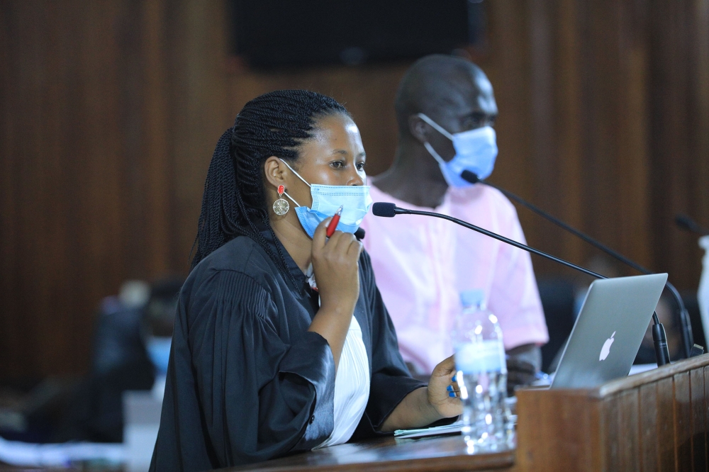 A woman lawyer assists a suspect during FLN trial on May 6, 2021. The Rwanda Bar Association says it has stepped up efforts to increase the number of women lawyers practicing in the country. Photo: Sam Ngendahimana