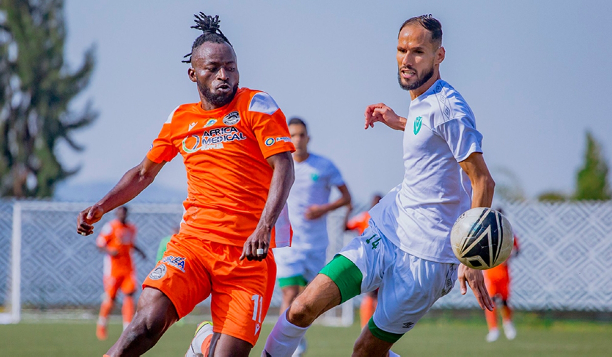 AS Kigali striker Shaban Hussein Shabalala dribbles past Al Nasr defender during the return leg goalless draw at Huye Stadium on Saturday, October 15. Photo: Courtesy.