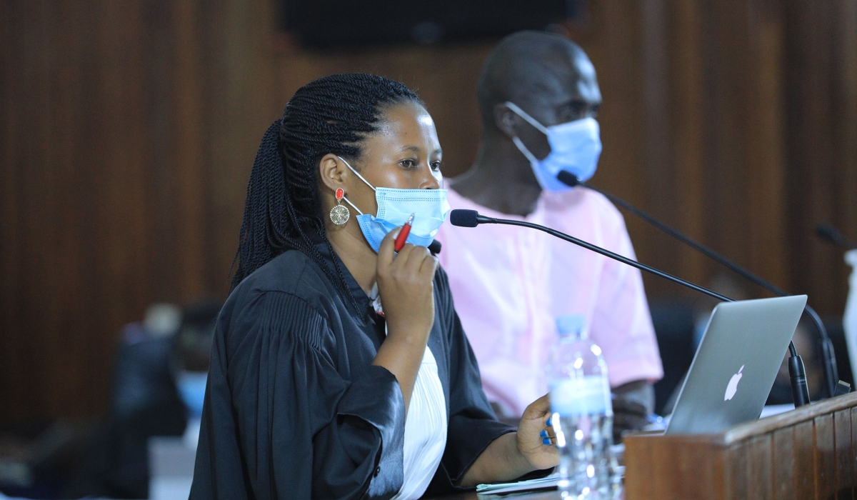 A woman lawyer assists a suspect during FLN trial on May 6, 2021. The Rwanda Bar Association says it has stepped up efforts to increase the number of women lawyers practicing in the country. Photo: Sam Ngendahimana