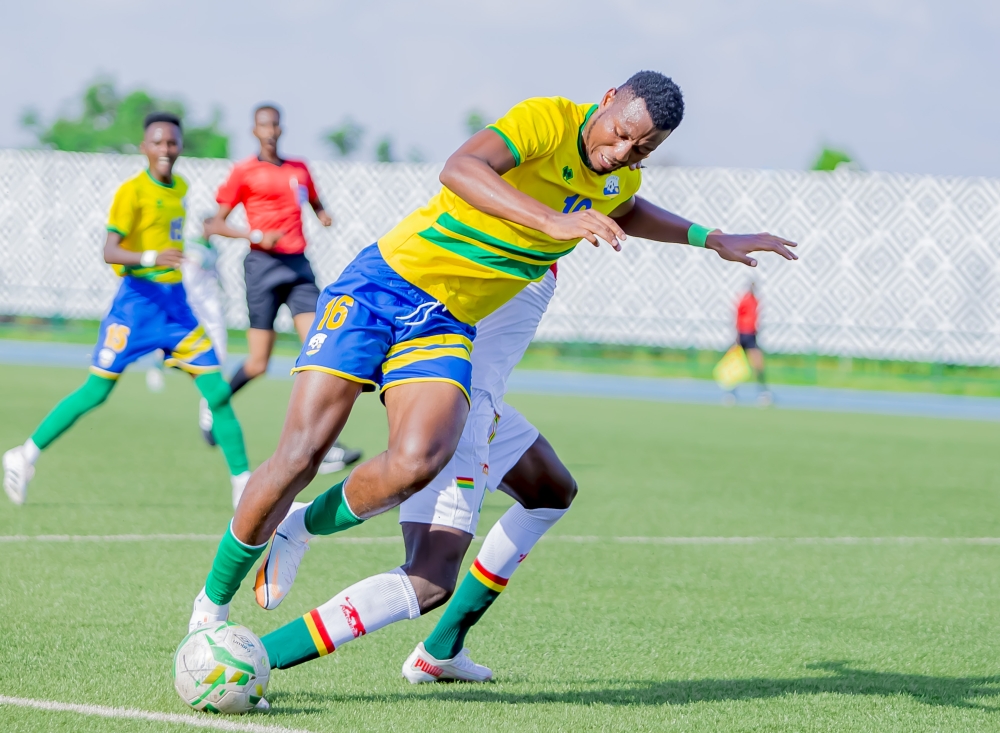 The U-23 Amavubi player  Ashraf Kamanzi vies for the ball against Mali&#039;s defender during a 1-1 draw in the first leg gameat Huye Stadium on Saturday, October 22. Courtesy
