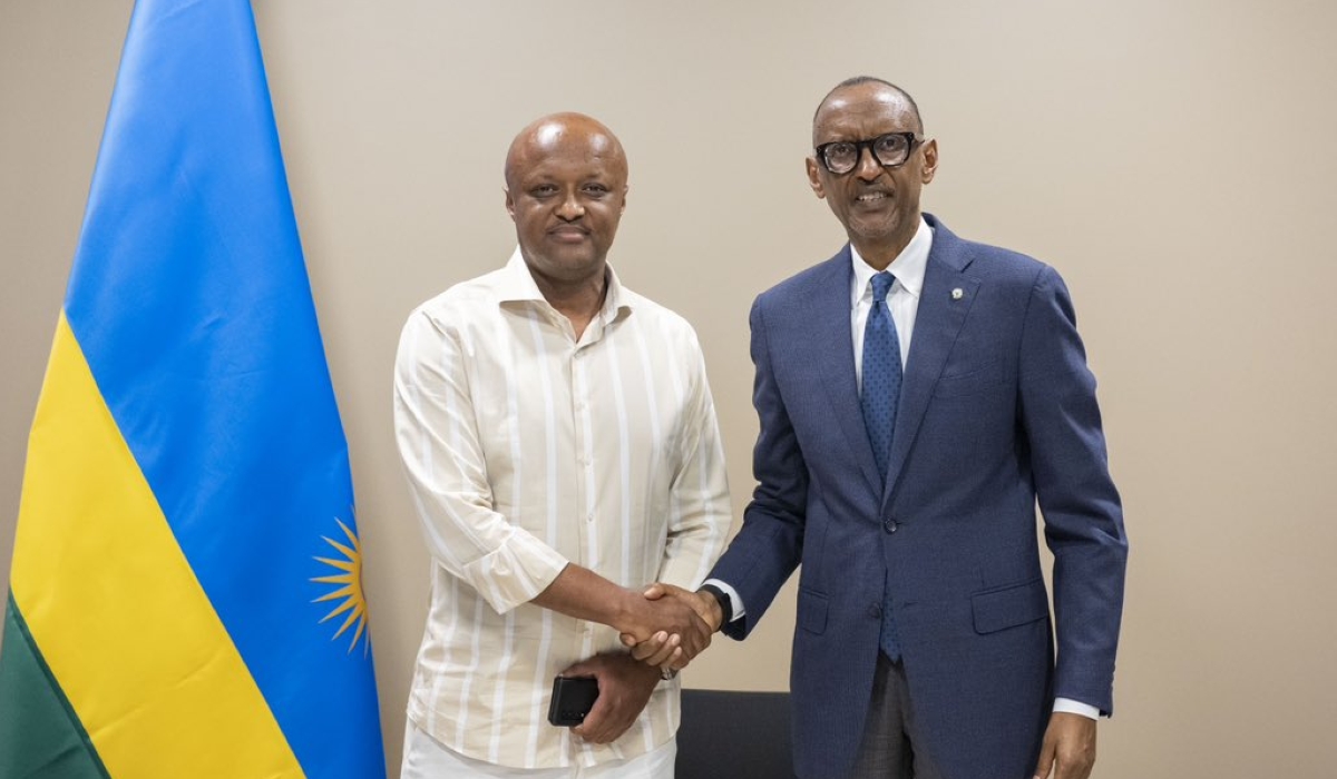 President Paul Kagame with Jimmy Gatete who was among Football legends from Africa, in Kigali on October 13. Photo: Village Urugwiro.
