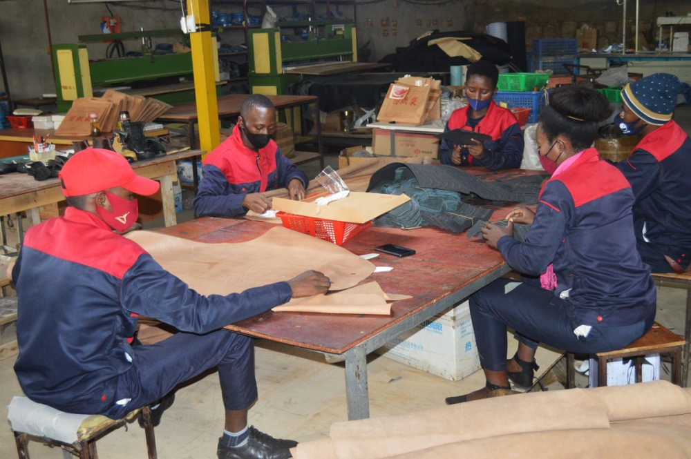 Workers at Kigali Leather Ltd in Bugesera District. A modern factory able to produce 900,000 shoes per month is being constructed in Kigali’s Special Economic Zone. Photo: File.