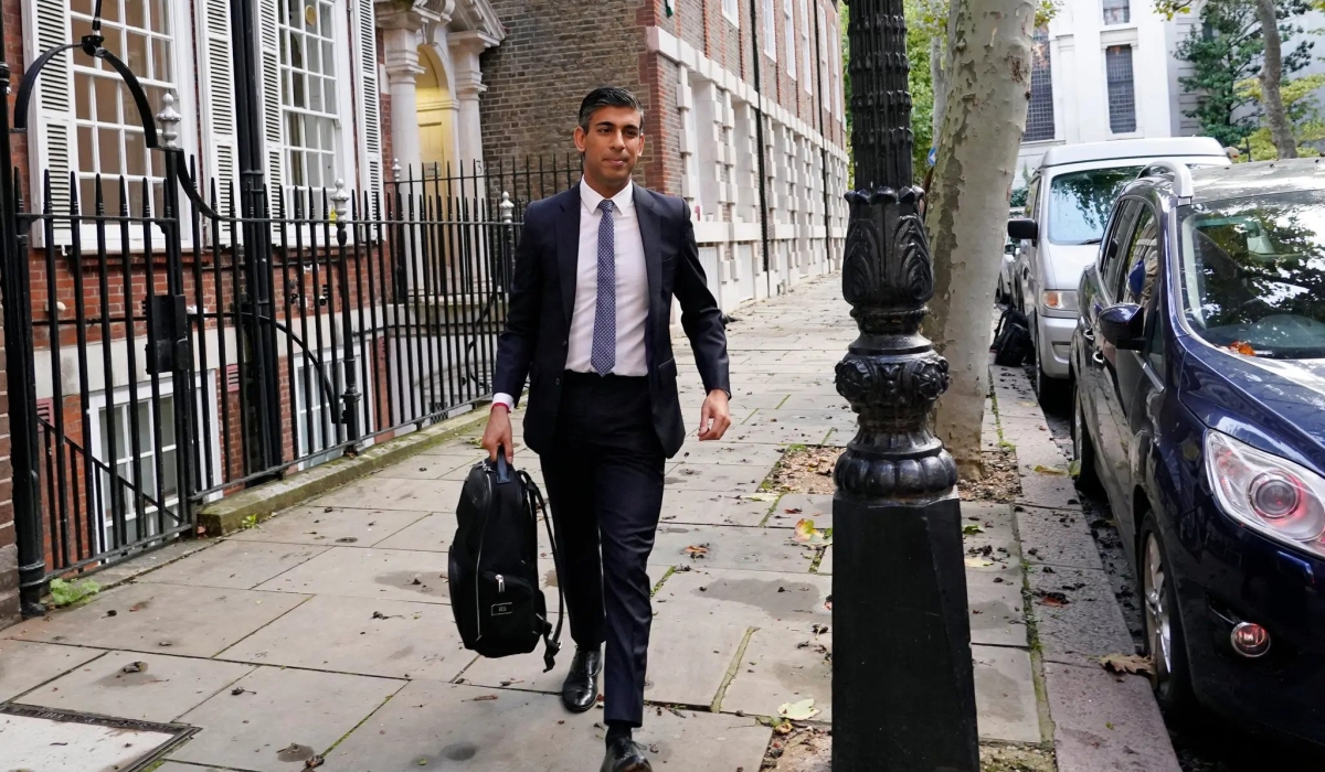 Rishi Sunak leaving the campaign office in London on Monday. / Credit: Aberto Pezzali/Associated Press