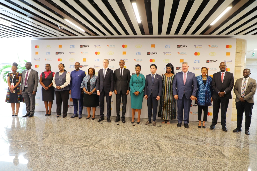 President Paul Kagame in a group photo with other officials at the  opening of the  Mobile World Congress in Kigali  on Tuesday, October 25. Photo by Craish BAHIZI