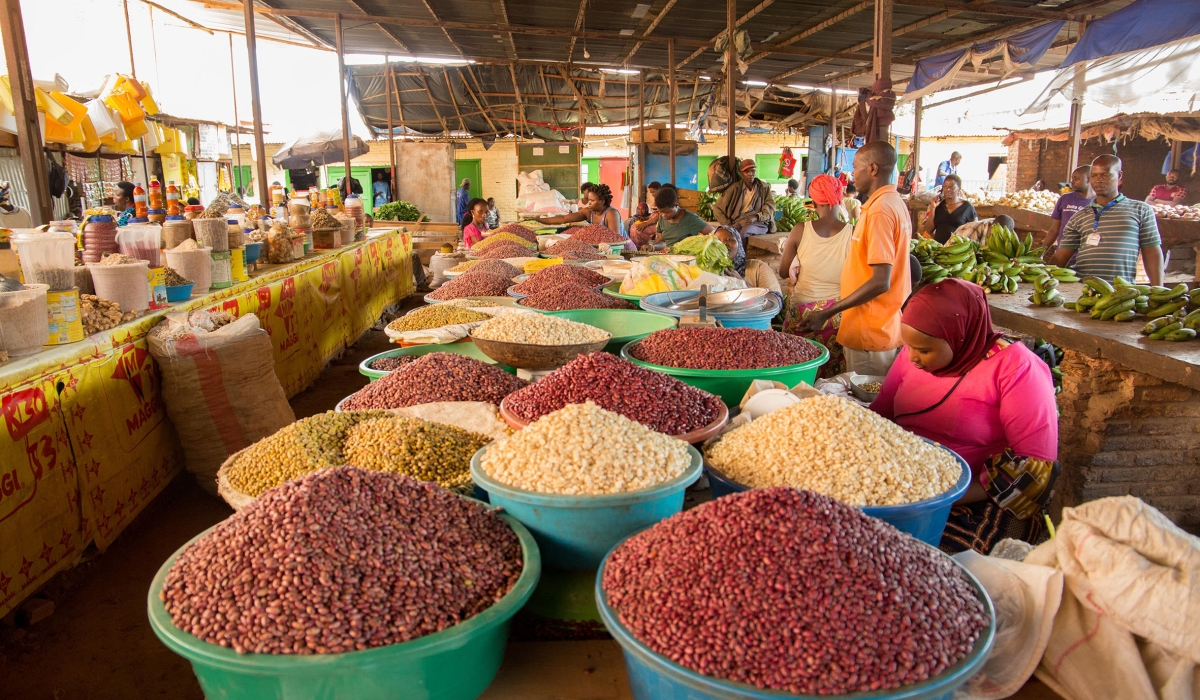 Foodstuff vendors at Kimisagara market in Nyarugenge District. The food system involves the primary production of food, food services, consumption, and disposal. Photo: Craish Bahizi.