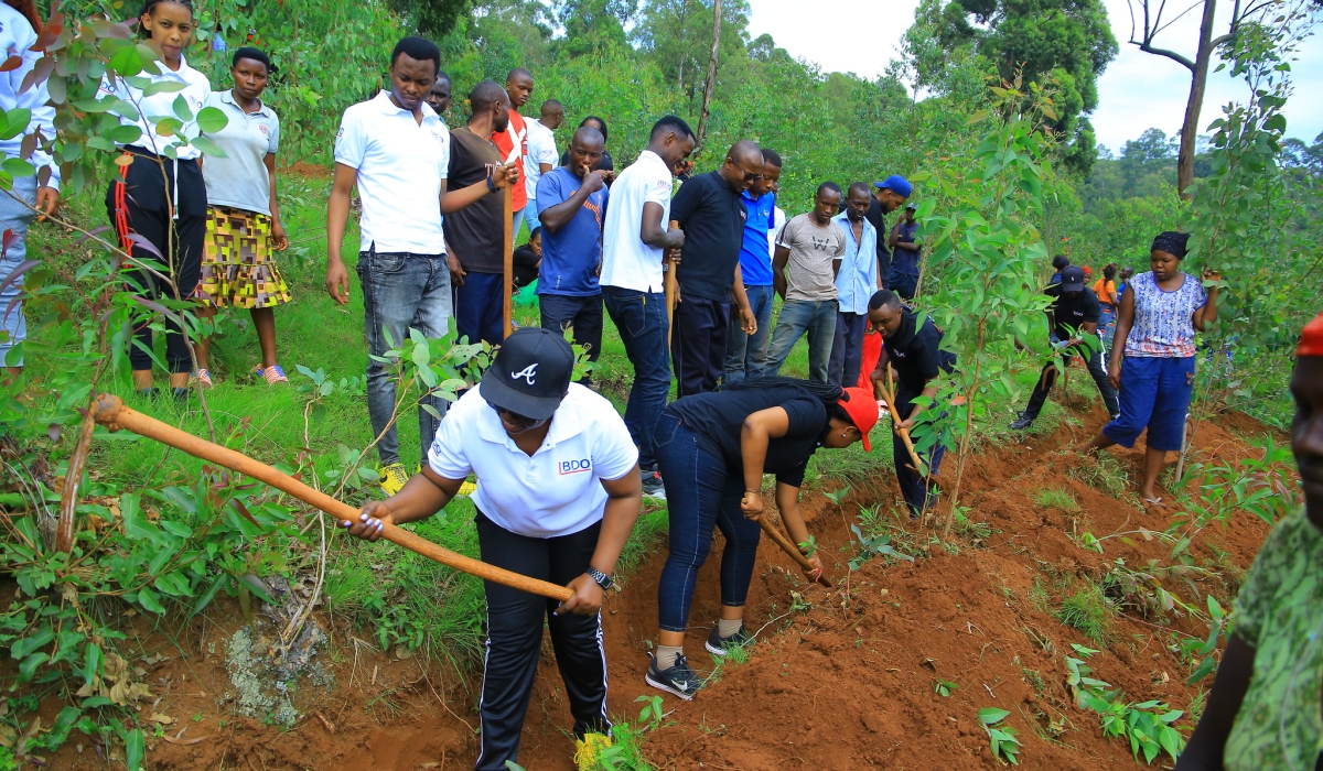 BDO EA Rwanda staff joined Rulindo residents during Umuganda before the hand over of health insurance premiums for 500 residents  on October 29. Craish Bahizi