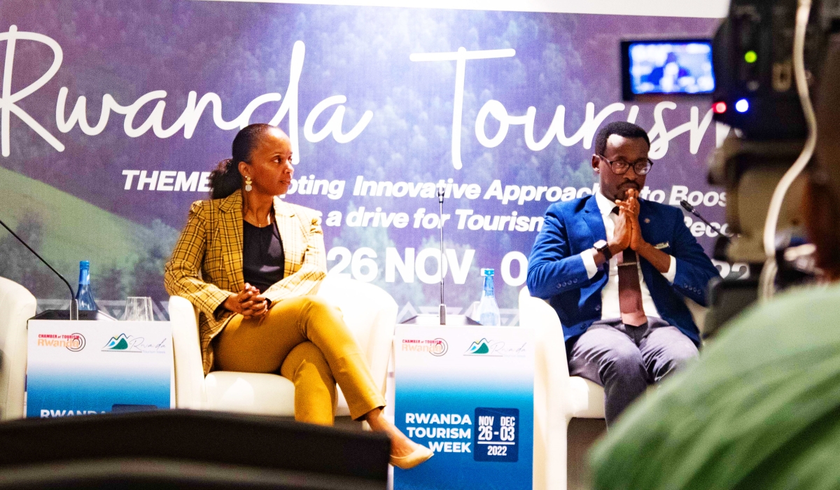 Frank Gisha Mugisha, the Director General of Rwanda Chamber of Tourism(Right) briefs the media on the upcoming Tourism week . Photo by  Dan Kwizera Gatsinzi