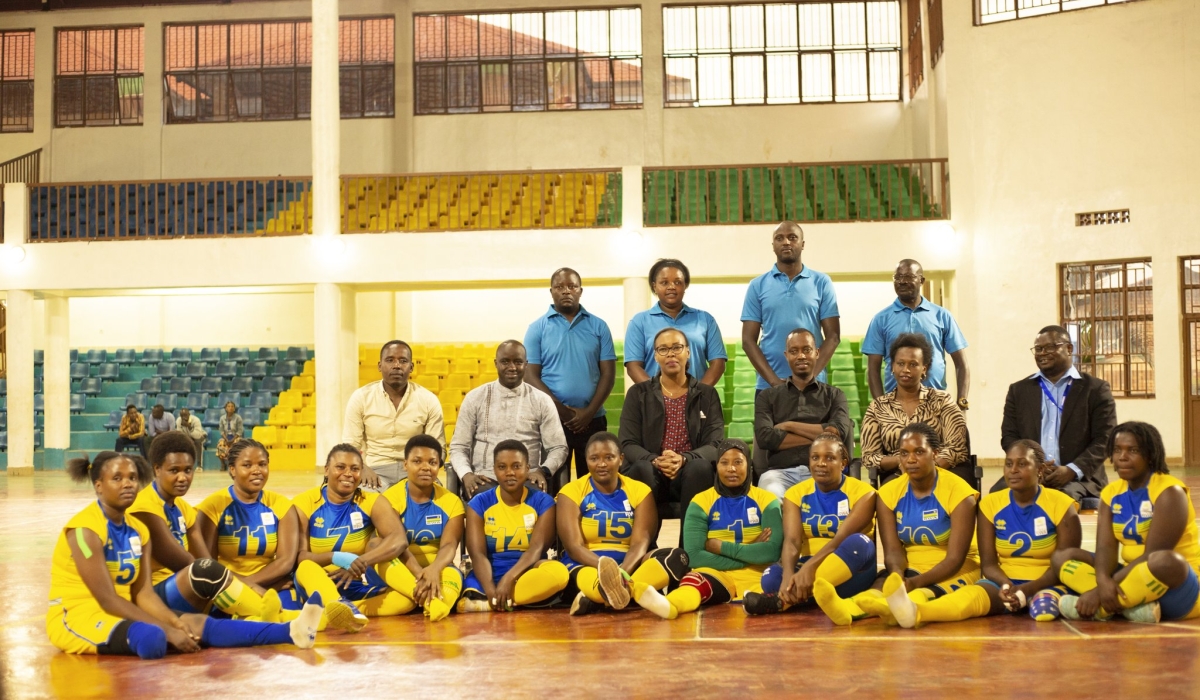 Minister of Sports Aurore Munyagaju with other officials with National sitting volleyball team in Gisagara. Thy were in a training ahead  the 2022 World Sitting Volleyball Championships in Bosnia and Herzegovina.