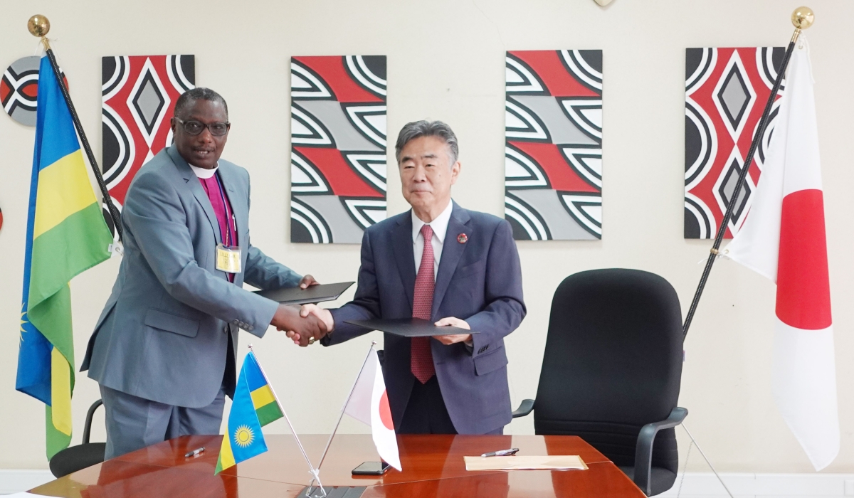 Japanese Ambassador to Rwanda, Masahiro IMAI and Emmanuel Ntazinda, the legal representative and Bishop of the Anglican Church of Rwanda Kibungo Diocese during the signing of  the agreement in Kigali on November 1