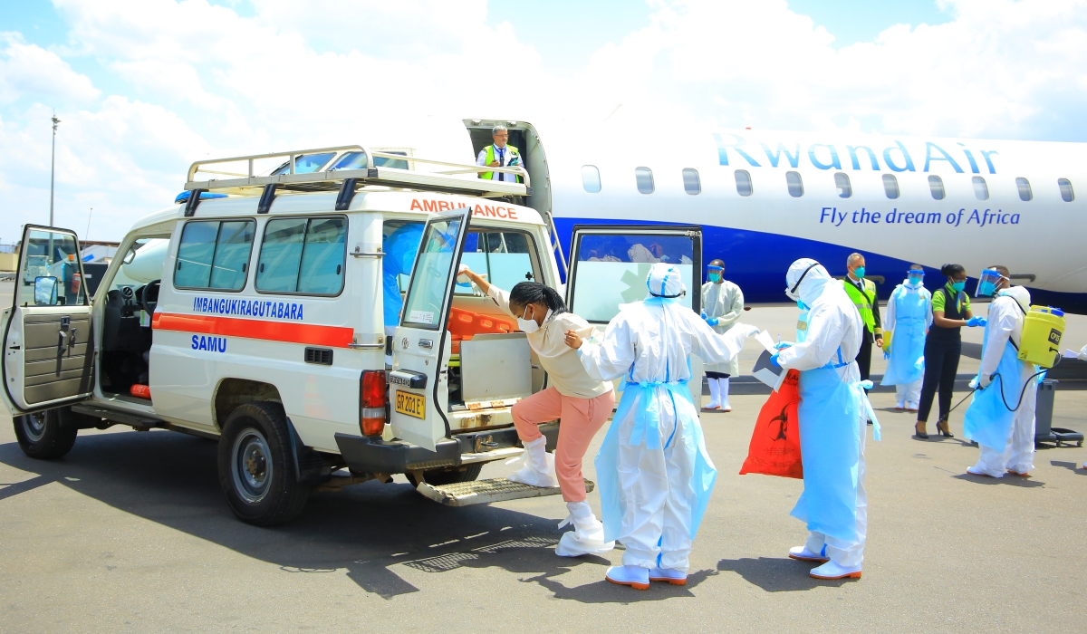 Health workers during Ebola simulation exercises, preparing the emergency response team in case they receive a suspected case of the highly contagious at Kigali International Airport  on Tuesday, November 1. Craish Bahizi