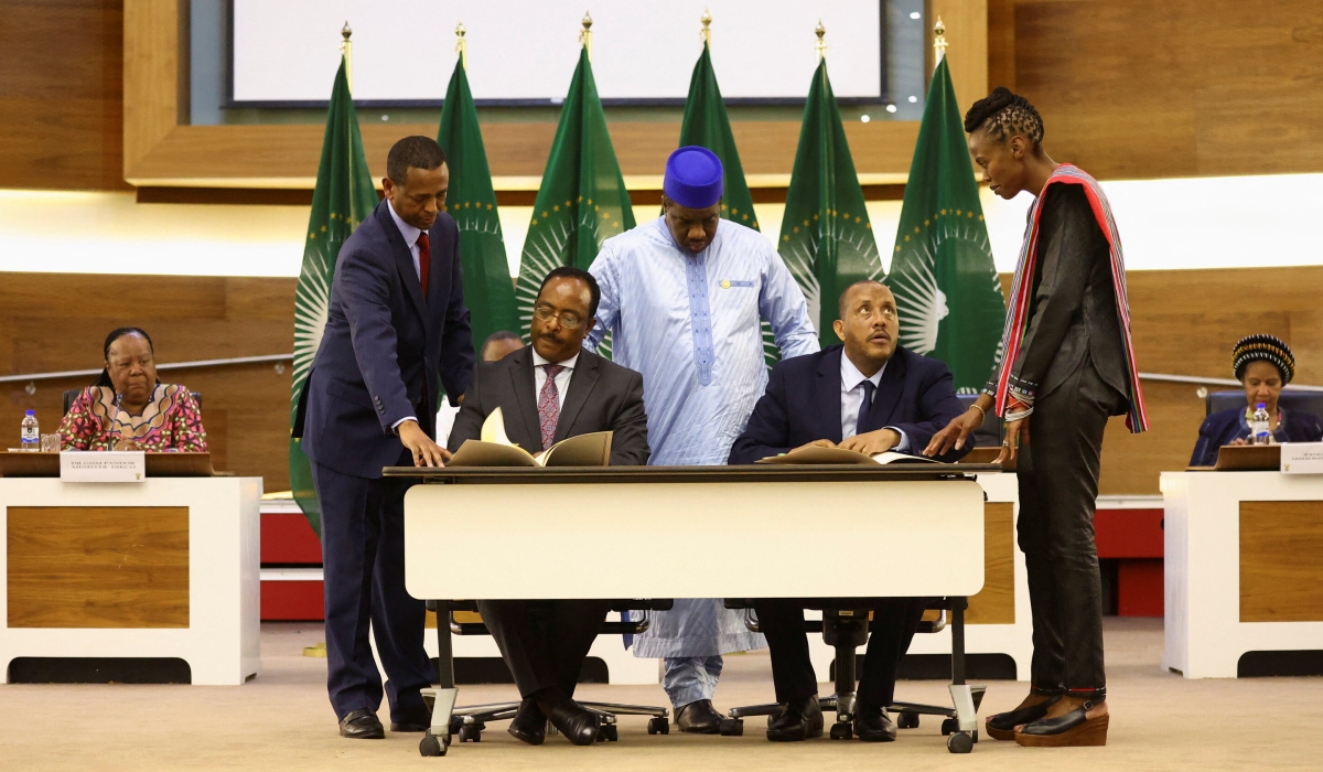 Signing the agreement on Wednesday in Pretoria to stop the fighting in the Tigray region of Ethiopia were Redwan Hussien, the Ethiopian government’s national security adviser, and Getachew Reda, a senior leader in the Tigray People’s Liberation Front. / Credit: Siphiwe Sibeko/Reuters