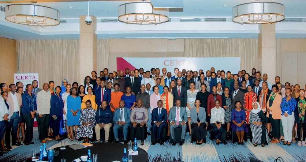 Officials and participants pose for a group photo after the discussions on the impacts of menstrual leave in Kigali on November 3. Courtesy 