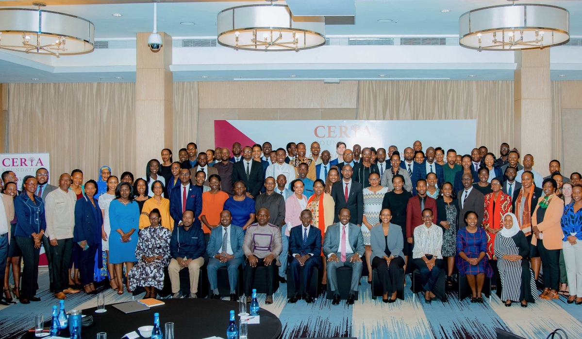 Officials and participants pose for a group photo after the discussions on the impacts of menstrual leave in Kigali on November 3. Courtesy 