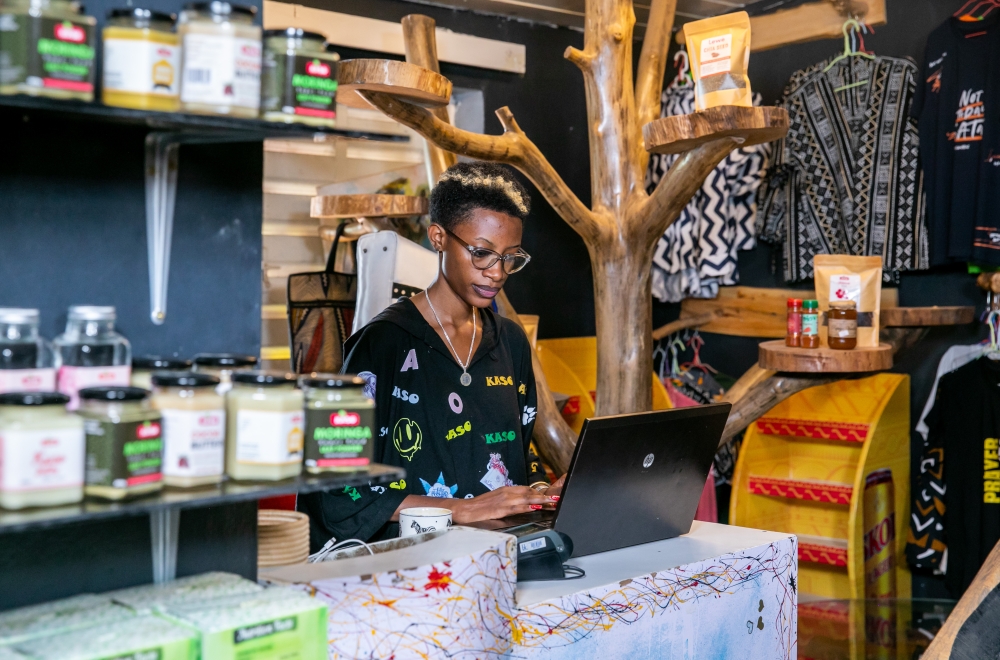Annick Umutibagirana, Managing Director of Holly Trust Ltd,  in her  showroom in Kiyovu Sector, from where they distribute products to different shops and marketplaces in the country. Photos by Olivier Mugwiza