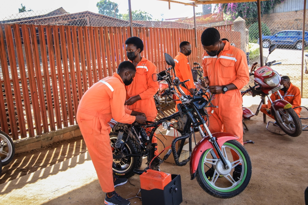 Technicians transfom a motobike into e-bike in Kigali. The fund is expected to support Rwanda to achieve its climate and devpt goals as well as create green jobs  in sustainable agriculture, renewable energy, e-mobility.Craish