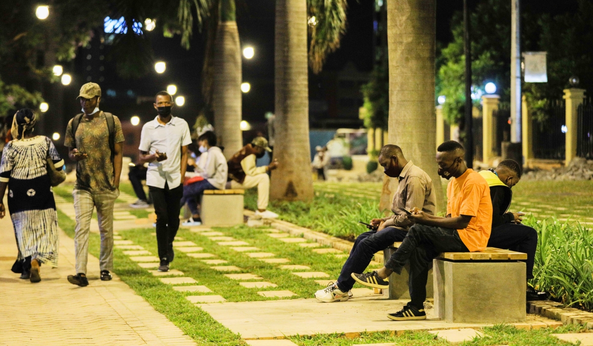 People enjoy a time out at Imbuga City Walk in Kigali’s Central Business District. Photo: Dan Nsengiyumva.