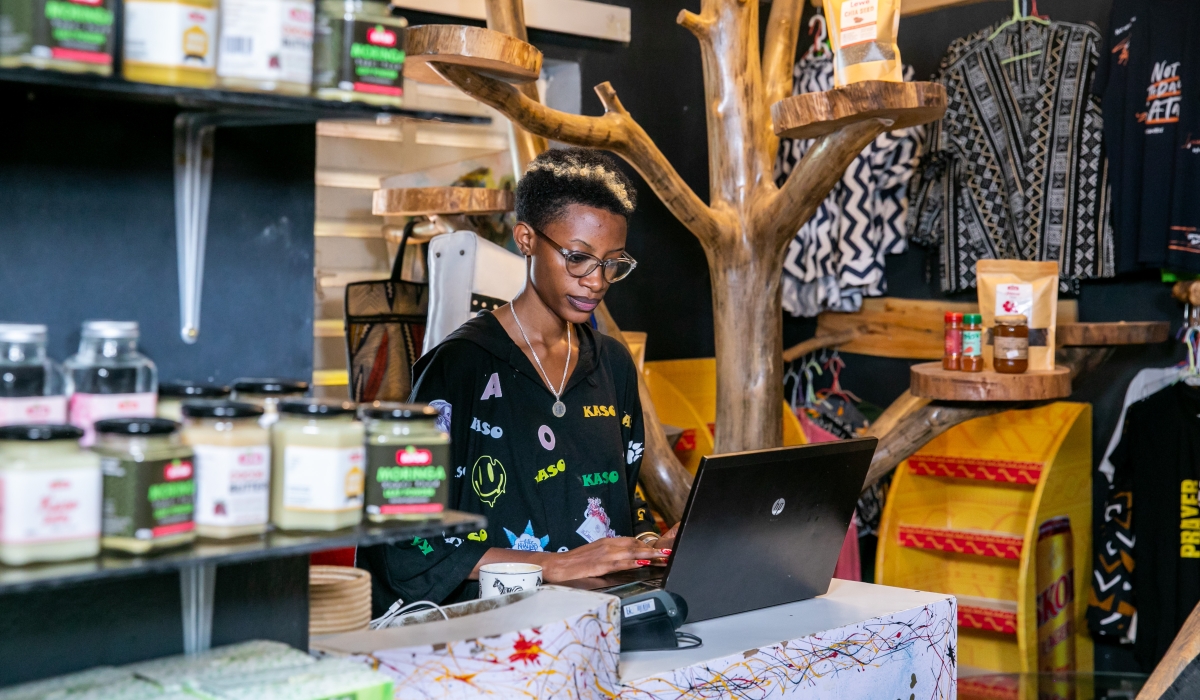 Annick Umutibagirana, Managing Director of Holly Trust Ltd,  in her  showroom in Kiyovu Sector, from where they distribute products to different shops and marketplaces in the country. Photos by Olivier Mugwiza