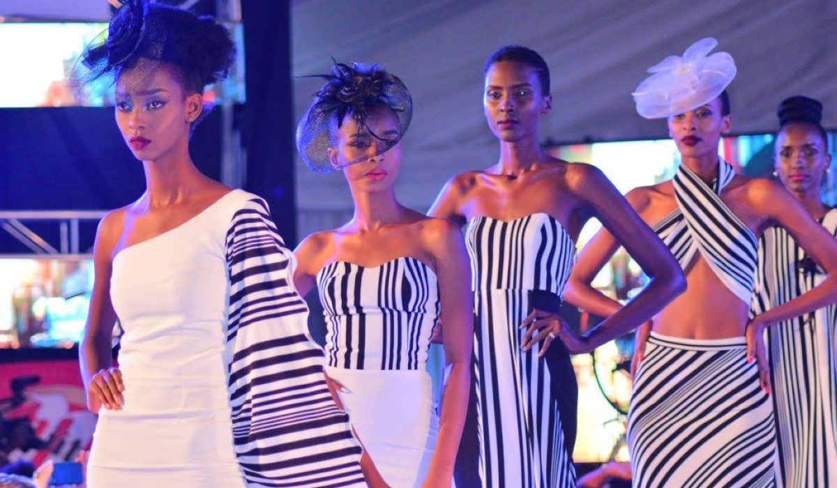 Models showcase designs during past Kigali International Fashion Week events