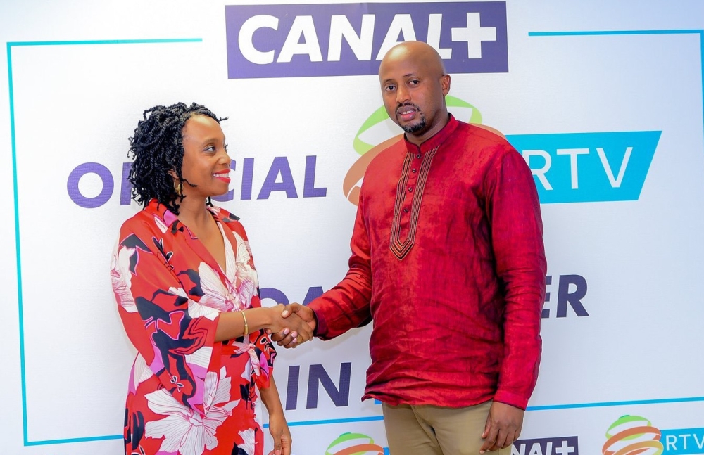 Sophie Tchatchoua, the Managing Director of Canal Plus Rwanda and Rwanda Broadcasting Agency Director General Arthur Asiimwe after signing the agreement in Kigali on November 8. Courtesy