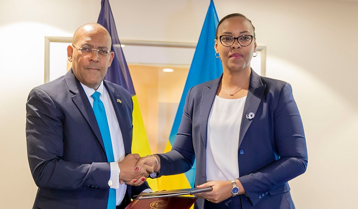 Minister of Sports Mimosa Aurore Munyagaju and Kerrie Symmonds, Minister of Foreign Affairs and Foreign Trade of Barbados during the signing of a partnership agreement in Sports Development in Kigali on November 9. Courtesy