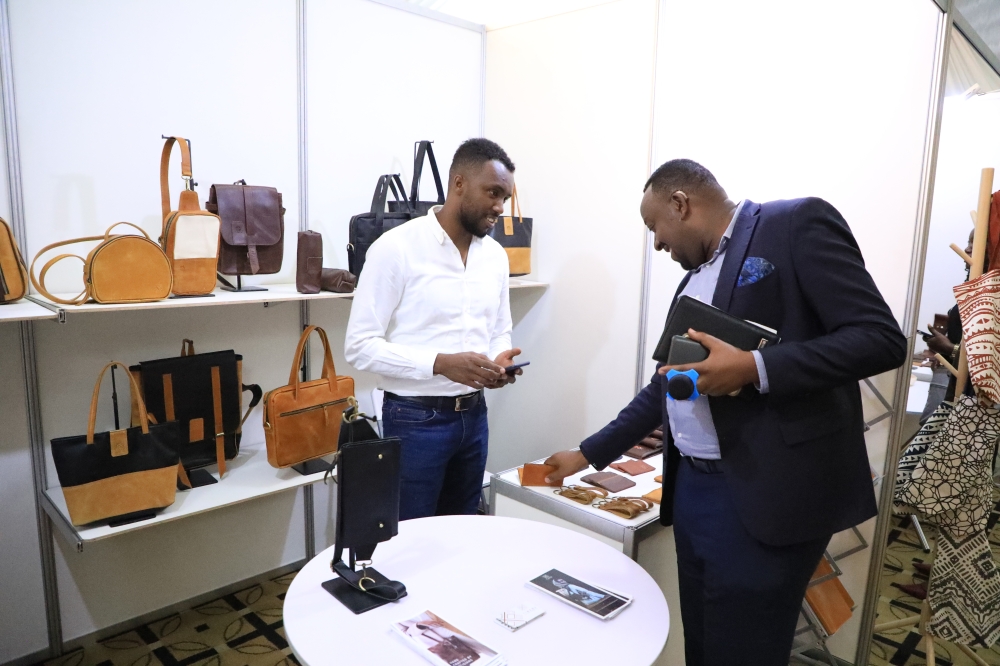 A delegate  visits one of the stands that are showcasing their leather products during TALIF in Kigali on November 9. This year&#039;s forum was dominated by Ethiopian leather producers, seeking to invest in Rwanda&#039;s leather industry. All photos by Craish Bahizi