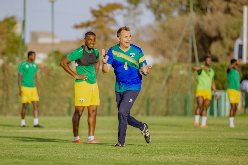 Head coach of national footbal team gives iinstruction to the players during a training session. Amavubi, is planning to play against Sudan in a FIFA international friendly. Courtesy