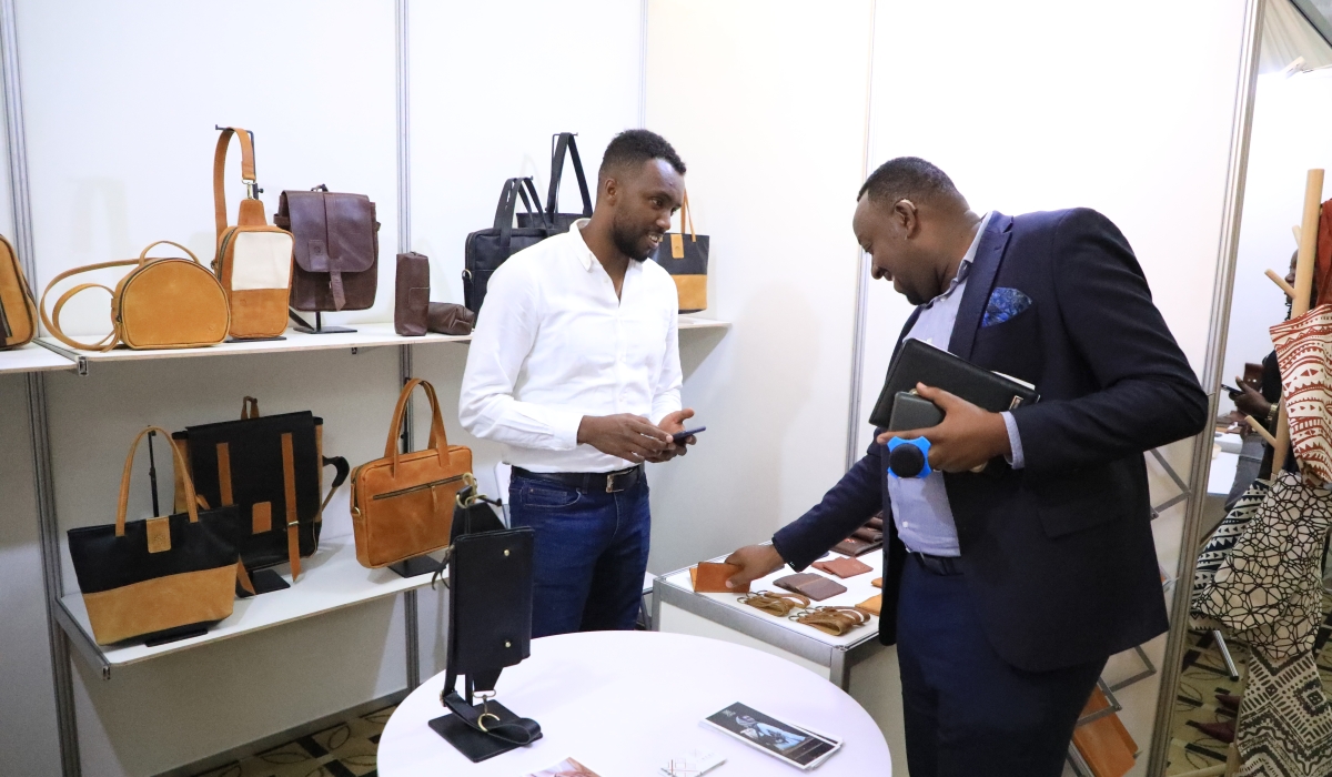 A delegate  visits one of the stands that are showcasing their leather products during TALIF in Kigali on November 9. This year&#039;s forum was dominated by Ethiopian leather producers, seeking to invest in Rwanda&#039;s leather industry. All photos by Craish Bahizi