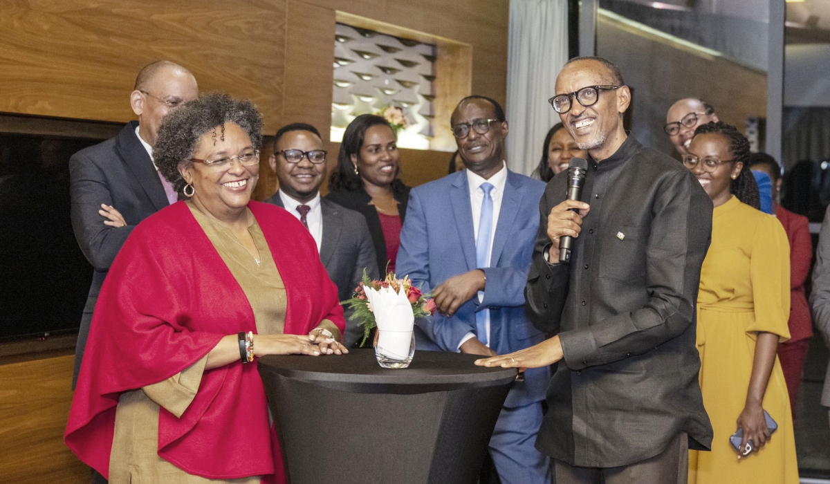 President Paul Kagame and Barbados Prime Minister, Mia Amor Motley share a moment as  He speaks at a reception event at Kigali Convention Centre on November 10. Photo by Village Urugwiro