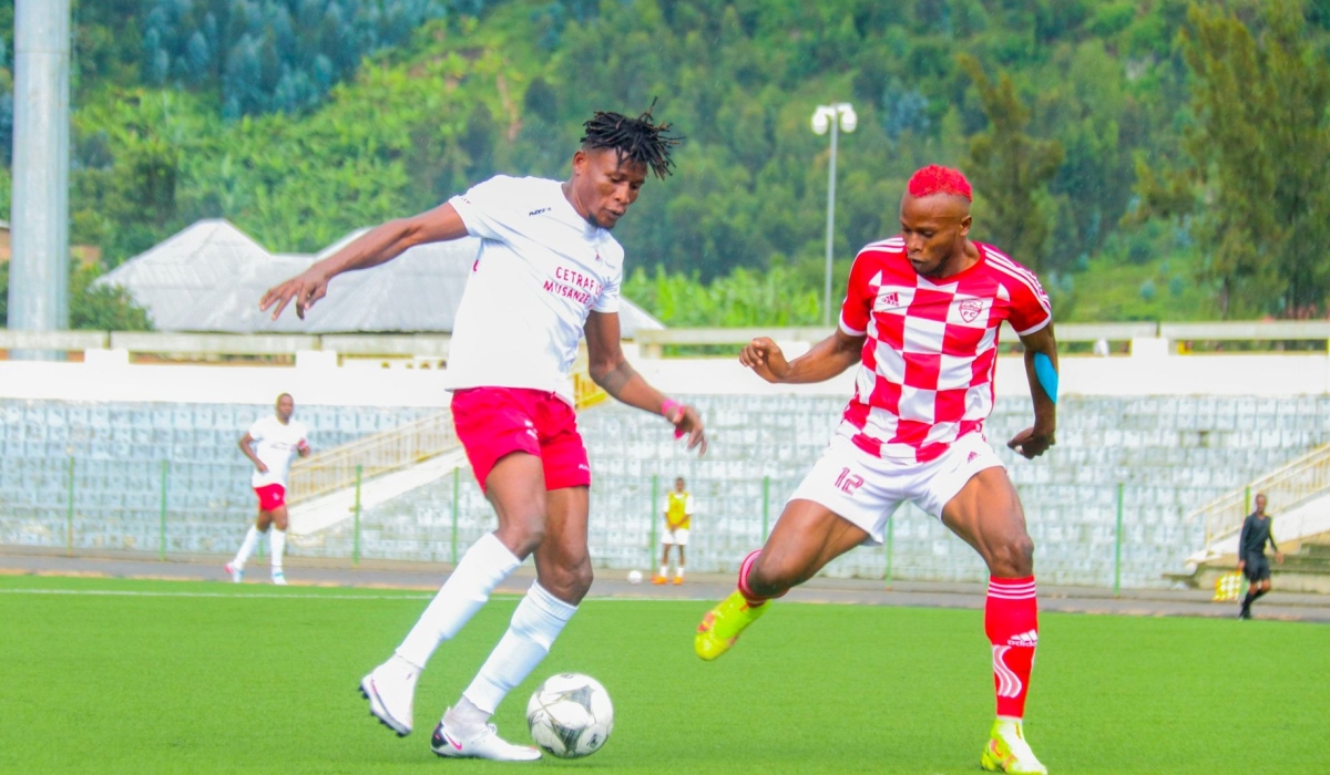 Etincelles FC forward Peter Agblevor  tries to go past Musanze defender during the match. The Rubavu based player netted the first goal as his team defeat Musanze FC  3-2  at the Umuganda Stadium in Gisenyi on Saturday, November 12. Courtesy
