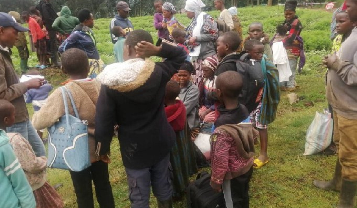 Some of the 89 DR Congo citizens on their arrival in Bugeshi Sector in Rubavu on Sunday, November 13. They are fleeing from fights between the government forces FARDC and M23 rebels group. Photo by Igihe