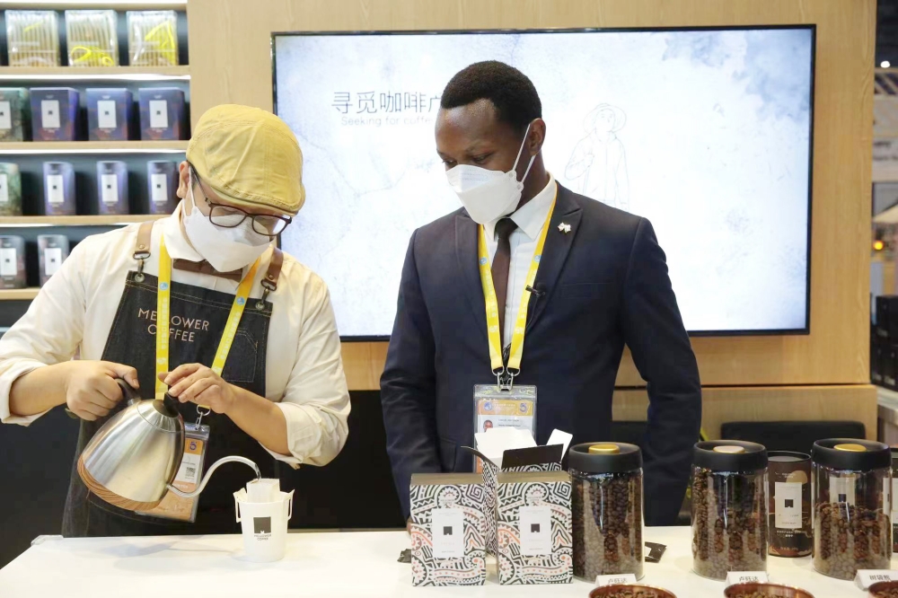 An exhibitor of Rwandan coffee showcases how good it is during the 5th China International Import Expo at the National Expo in Shanghai on November 8. Courtesy
