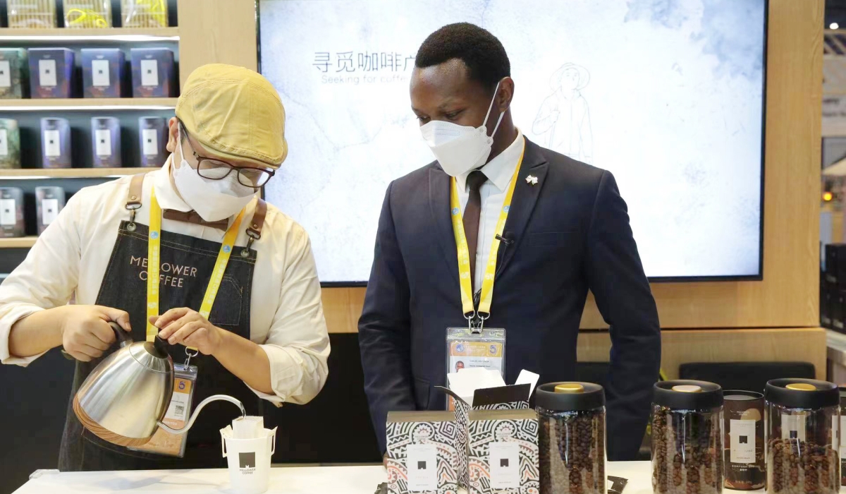 An exhibitor of Rwandan coffee showcases how good it is during the 5th China International Import Expo at the National Expo in Shanghai on November 8. Courtesy