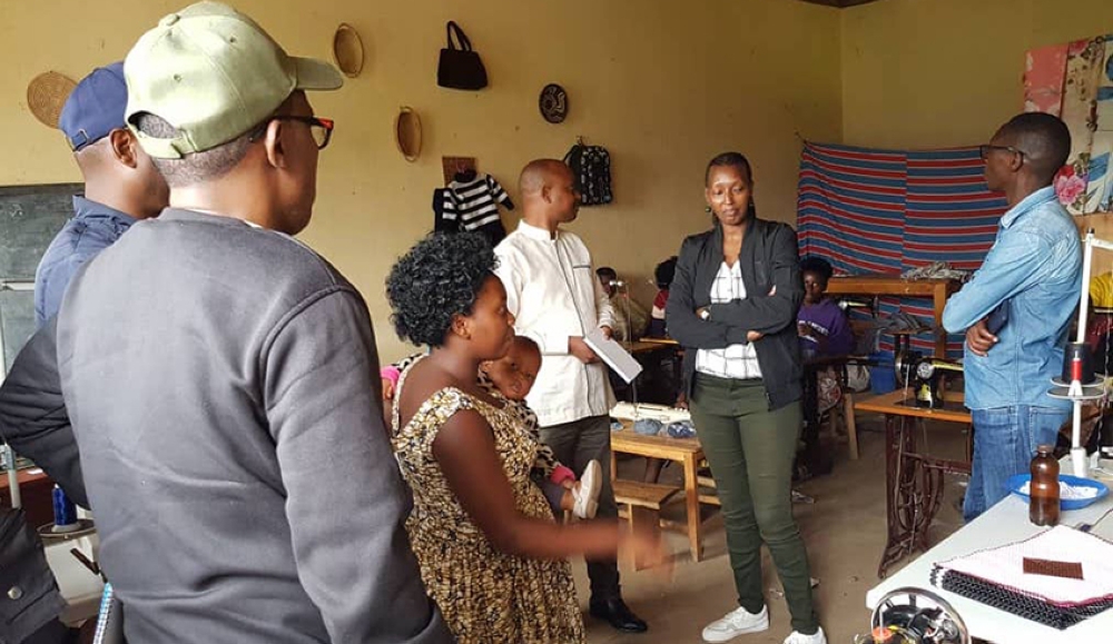 Members of Parliament during  a three-week outreach tour countrywide to assess the implementation of some public projects,seen here interact with residents in Nyabihu District on November 18. Courtesy