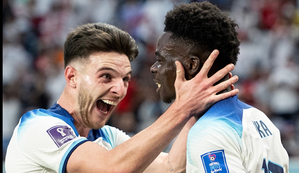 England National Team players&#039; Declan Rice and  Bukayo Saka celebrate the goal during the 6-2 match against Iran during the World Cup in Qatar, on November 21. Photo credit: FIFA