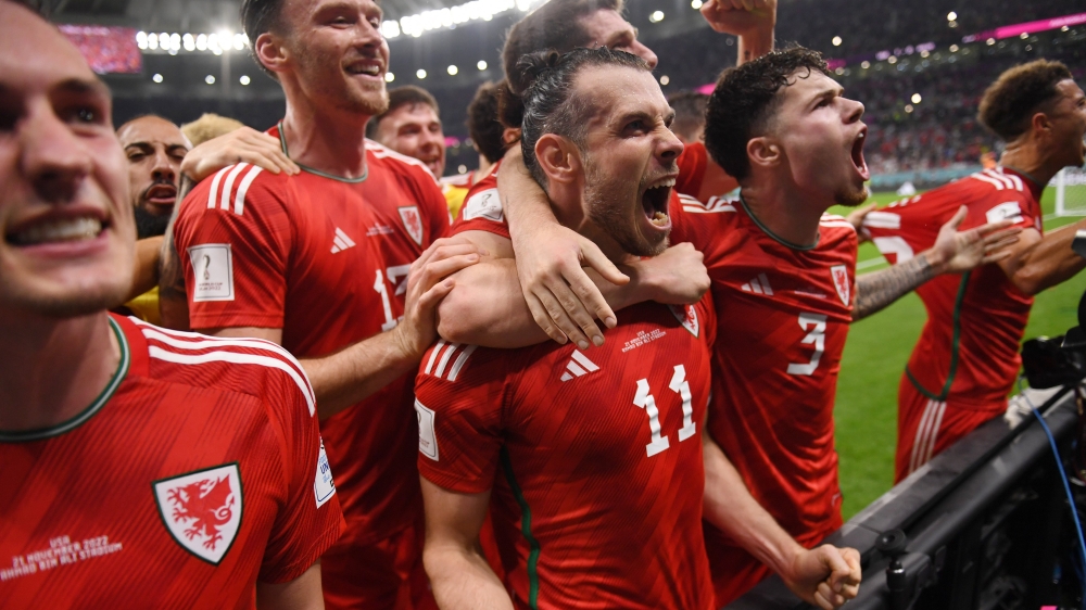 Wales players celebrate during the 1-1 draw against the USA during the World Cup, on November 21. Photo-FIFA