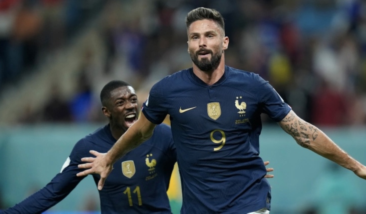 Olivier Giroud netted twice to become France&#039;s joint all-time top goal-scorer [Francisco Seco/AP]