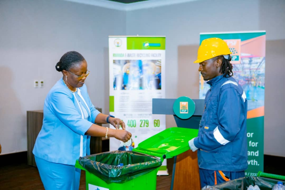 Minister of Environment, Jeanne d&#039;Arc Mujawamariya disposing plastic waste in a dustbin during the launch of a project to manage single use plastics on November 23, 2022. Courtesy