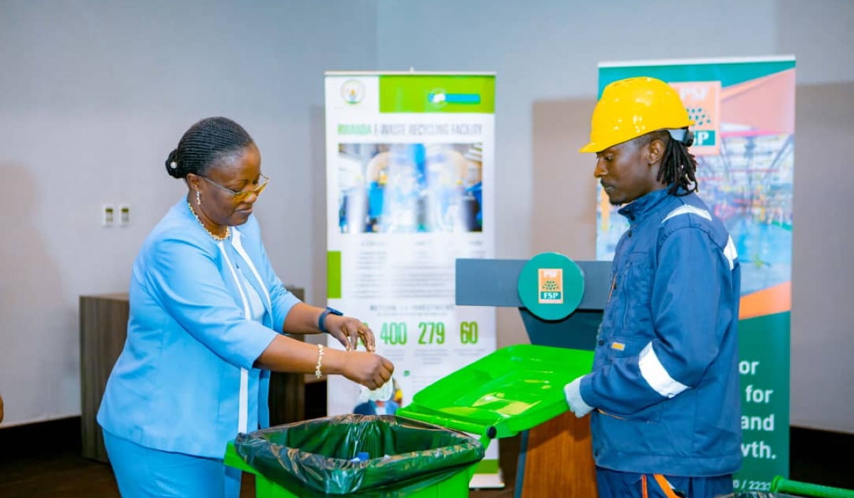 Minister of Environment, Jeanne d&#039;Arc Mujawamariya disposing plastic waste in a dustbin during the launch of a project to manage single use plastics on November 23, 2022. Courtesy