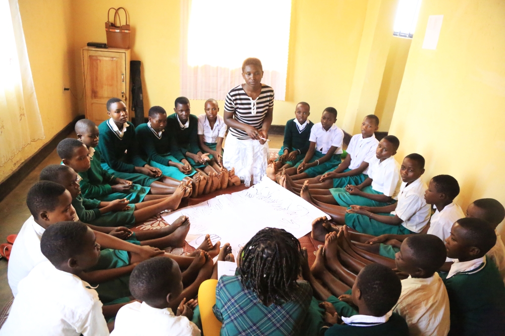 Young girls with their mentors discuss  reproductive health in Gisagara District. The new study revealed that parent-child talks on sexual reproductive health are at low level. Photo by  Sam Ngendahimana
