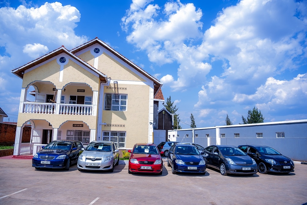 Some cars that Tomtransfers Company uses in the business of Renting and Selling cars in Kigali. Several investors are suing Tom Transfers Company. Courtesy