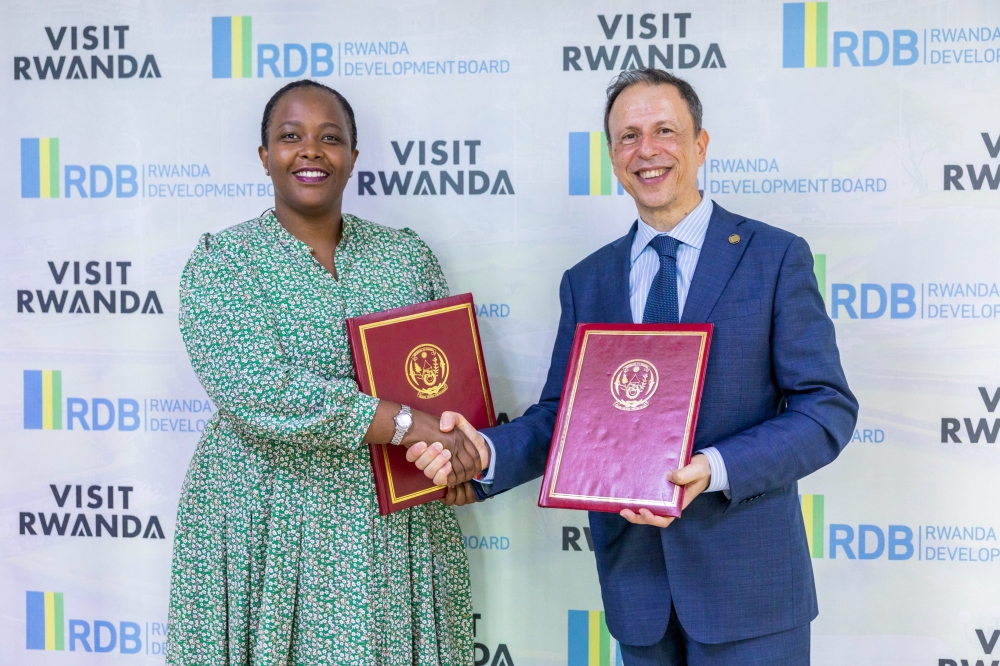 Rwanda Development Board CEO Clare Akamanzi and Luigi Ciarrocchi, CCUS, Forestry and Agri-Feedstock Director at Eni  after signing the agreement in Kigali on November 24. Courtesy