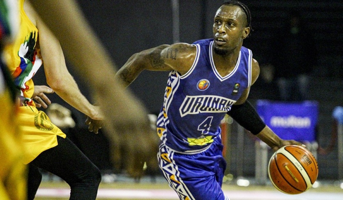 Adonis Filer tries to go past Tigers&#039; players as he drops 27 as Burundi&#039;s Urunani stuns Tigers. The Burundians beat hosts Cape Town Tigers 59-49 to finish top of the group and will head to the Semi-Finals high on confidence. Courtesy
