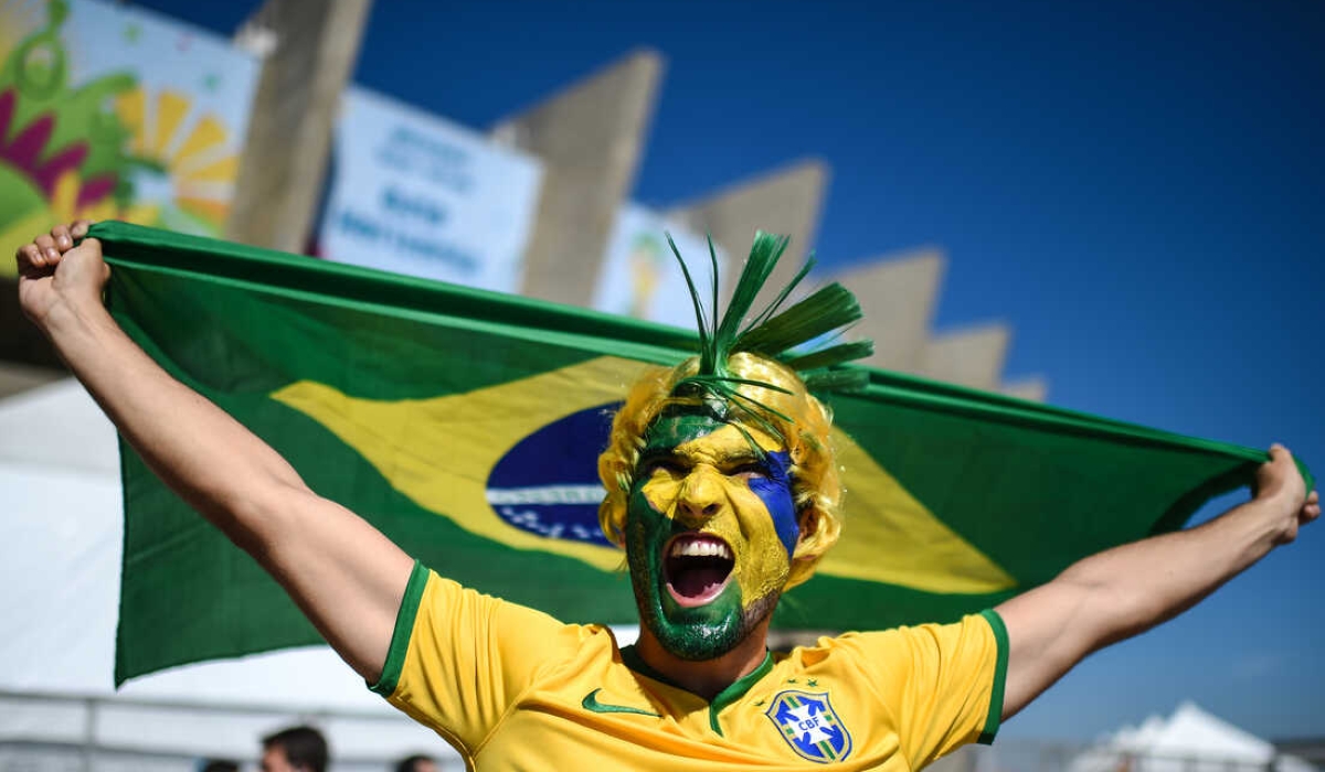 BELO HORIZONTE, BRAZIL - JUNE 28:  Fans arrive prior to kickoff to the 2014 FIFA World Cup Brazil round of 16 match between Brazil and Chile at Estadio Mineirao on June 28, 2014 in Belo Horizonte, Brazil.  (Photo by Pedro Vilela/Getty Images)
